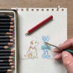 An artist painting a watercolour dog for a birthday card