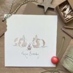 A birthday card with two cute guinea pigs