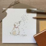 A greeting card with a dog and confetti