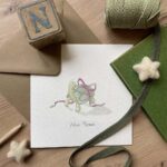 A new home card with a tortoise