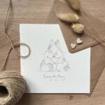 A love card with two bunny rabbits