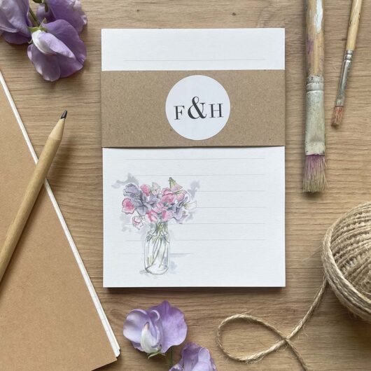 A notepad with a floral design