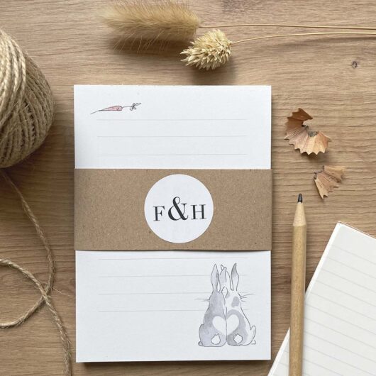 A lined notepad with a rabbit design
