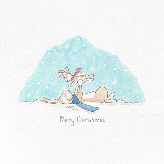 A festive illustration of two bunnies