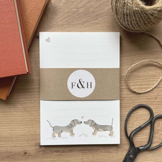 A cute notepad with sausage dog design