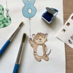 An artists painting of a children's birthday card design