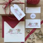 A set of stationery with a Christmas card, notepad & gift tag