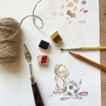 A watercolour painting for Father's Day with a dog & football