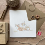 A greetings card with three cute corgi dogs, suitable for birthdays and all occasions