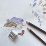 An artist drawing a mouse eating a chocolate bar