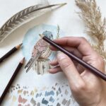 An artist drawing a kestrel