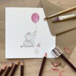 A birthday card with a cute elephant