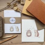 A greeting card & notepad with a matching hedgehog design