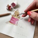 An artist painting a mouse