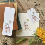 Stationery with a cute mouse design, showing a greetings card, bookmark & gift tag