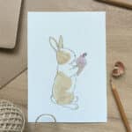 A rabbit eating an ice cream